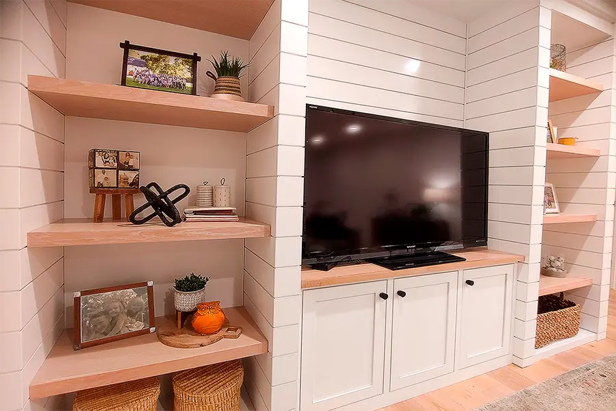 Built-in shelving around TV